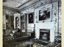 Ornately carved bookcase commissioned to compliment existing highly detailed woodwork in a Stately Home